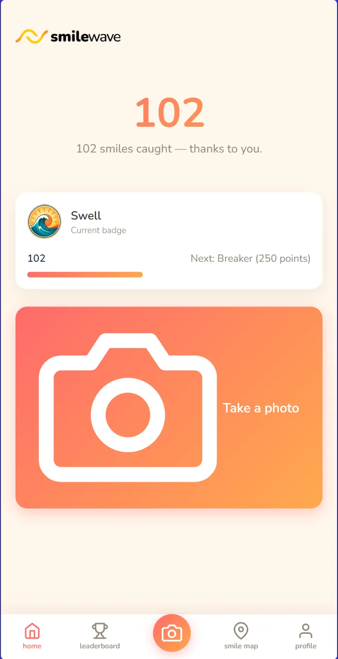 SmileWave home screen showing 102 smiles caught and the current badge